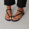 imageCUSHIONAIRE Life Strappy Flat Thong Sandals for Women with Toe Loop Memory Foam and Adjustable Ankle Strap Womens SandalsBlack