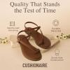 imageCUSHIONAIRE Life Strappy Flat Thong Sandals for Women with Toe Loop Memory Foam and Adjustable Ankle Strap Womens SandalsWhiskey