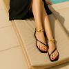 imageCUSHIONAIRE Secret Flat Sandals for Women with Gold Ankle Cuff and Toe Ring Strap Vegan Leather Dress SandalsBlack
