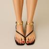 imageCUSHIONAIRE Secret Flat Sandals for Women with Gold Ankle Cuff and Toe Ring Strap Vegan Leather Dress SandalsBlack