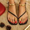 imageCUSHIONAIRE Secret Flat Sandals for Women with Gold Ankle Cuff and Toe Ring Strap Vegan Leather Dress SandalsBlack