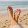 imageCUSHIONAIRE Cruise Flip Flops for Women Footwear  Vacation Beach Essentials  Casual Summer Sandals for Women with Wide WidthLeopard Smooth