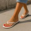 imageCUSHIONAIRE Cruise Flip Flops for Women Footwear  Vacation Beach Essentials  Casual Summer Sandals for Women with Wide WidthPink
