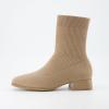 imageCUSHIONAIRE Womens Russel Knit Ankle Boot with Block Heel Memory Foam Wide Widths AvailableKnit Taupe