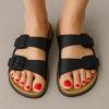 imageCUSHIONAIRE Plano SlipOn Sandals for Women with Arch Support Adjustable Buckle Straps and Stitched Outsole  Casual Flat Summer Womens SandalsBlack Nappa